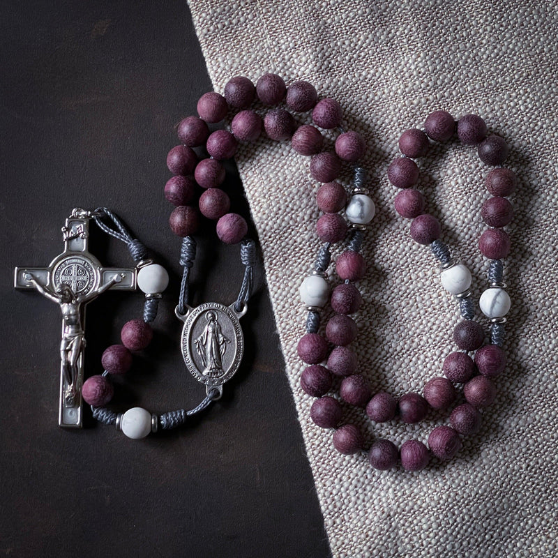 Purity Rosary — Purple Heart wood Hail Mary beads, Howlite Our Father beads, Miraculous Medal centerpiece, and St. Benedict Crucifix in white, handcrafted by The Catholic Woodworker